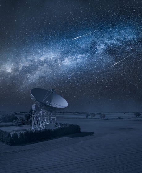 Astronomical observatory and milky way with falling stars above at night. Observatory astronomical in Poland.